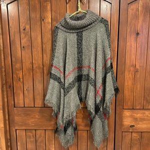 Gray, black and red poncho